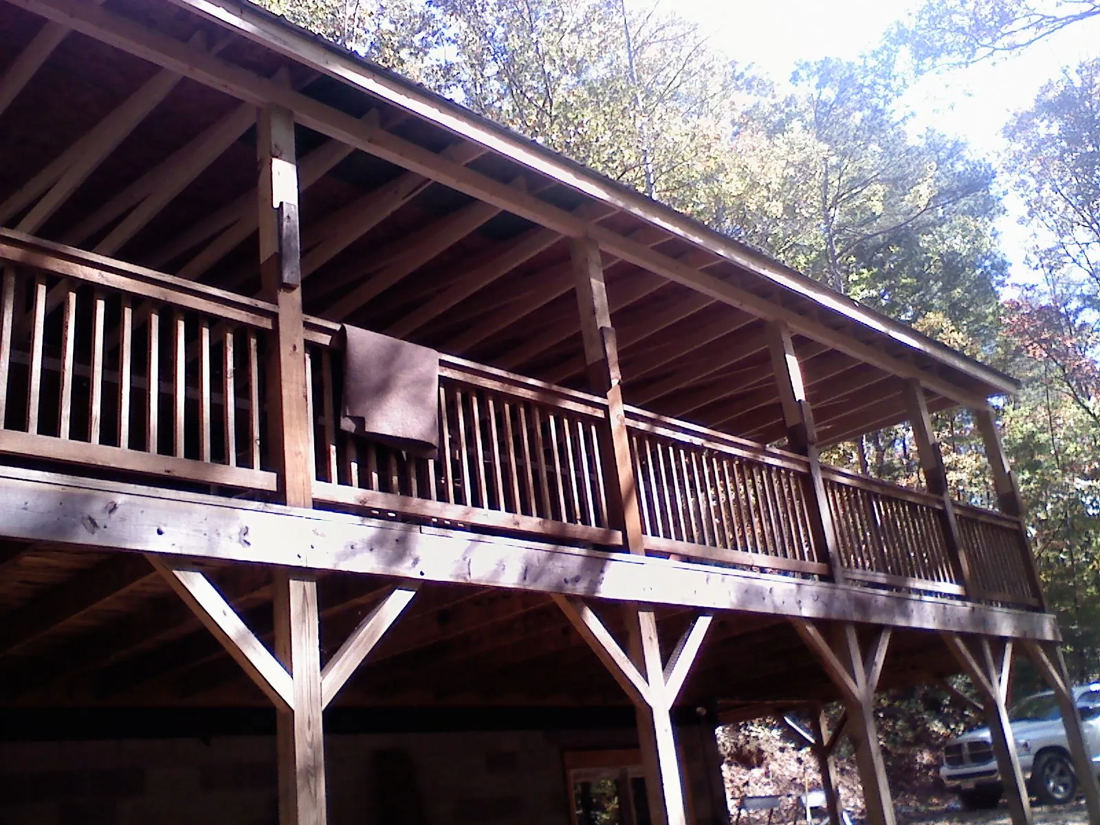 Timber framing under a new elevated porch and deck in Matteson